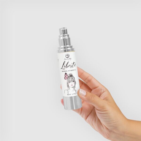 Fugtgivende intimolie Secret Play Liberté i airless-flaske på 50 ml