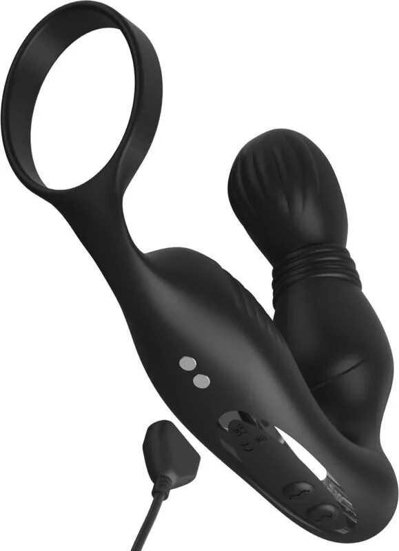 Massageren med sit magnetiske opladerkabel